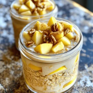 - 1 cup rolled oats - 2 cups almond milk (or any milk of your choice) - 2 tablespoons maple syrup - 1 teaspoon ground cinnamon - 1/4 cup Greek yogurt (or dairy-free alternative) - 1/4 cup chopped nuts (like walnuts or pecans) - 1/2 apple, diced (for topping) - A pinch of salt - Mixing bowl - Airtight containers or jars - Spoon or spatula When making Maple Cinnamon Overnight Oats, I always focus on the main ingredients first. The rolled oats form the base, giving you that hearty texture. Almond milk, or any milk you choose, makes it creamy and rich. I love the sweetness from maple syrup, and cinnamon adds that warm, cozy flavor. If you want to jazz it up, add Greek yogurt for creaminess. Nuts give a nice crunch, and diced apples bring freshness. A small pinch of salt enhances all the flavors, making each bite delightful. For equipment, you need a mixing bowl to combine everything. Airtight jars or containers store the oats well for overnight chilling. A spoon or spatula helps mix the ingredients thoroughly. The process is simple, making it easy for anyone to enjoy this tasty breakfast. Check out the Full Recipe for detailed steps! First, grab a medium bowl. Mix together: - 1 cup rolled oats - 2 cups almond milk (or your favorite milk) - 2 tablespoons maple syrup - 1 teaspoon ground cinnamon - 1/2 teaspoon vanilla extract - A pinch of salt Stir all these ingredients well. Make sure it’s smooth for a creamy texture. Now, gently fold in: - 1/4 cup Greek yogurt (or a dairy-free option) Mix it until the yogurt blends in. This adds a nice creaminess to your oats. Next, divide the mixture into two jars or containers. Make sure each jar has equal amounts. Then, add: - 1/4 cup chopped nuts (like walnuts or pecans) - 1/2 apple, diced Sprinkle these toppings on each jar. Seal the jars tightly. Place them in the fridge. Let them chill overnight or for at least 4 hours. This helps the oats soak up flavors. When you’re ready to eat, stir the oats well. This mixes the toppings back in. If you want, add some extra maple syrup or more nuts on top. Enjoy your tasty breakfast! For the full recipe, check the earlier section. You can tweak the sweetness to match your taste. Start with the recipe's two tablespoons of maple syrup. If you like it sweeter, add more syrup. If you prefer it less sweet, use less. This way, you get the perfect balance for your morning oats. Want to mix it up? Try adding cocoa powder for a chocolate twist. You can also add a splash of vanilla extract for deeper flavor. Both options will make your oats even more delicious. Experiment with different flavors to find what you love. Make your oats look as good as they taste! Use clear jars to show off those colorful layers. For a lovely touch, garnish with a sprinkle of cinnamon and some fresh apple slices on top. This not only makes it pretty but also adds extra flavor. For the full recipe, check the earlier section. {{image_4}} You can easily make this recipe vegan. Just swap out Greek yogurt for a plant-based yogurt. This keeps the oats creamy and adds a nice texture. Many stores offer great options like coconut or almond yogurt. Want to mix things up? Add fresh fruits like bananas, strawberries, or blueberries. Chia seeds also work well for extra fiber and protein. Nut butter is another tasty option. Just stir in a spoonful for a rich flavor boost. You can change the flavor based on the season. In the fall, add pumpkin spice for a cozy touch. In the summer, use fresh berries for a refreshing twist. These small changes keep your breakfast fun and exciting! Explore the [Full Recipe] for more details on making these delicious oats! Store your maple cinnamon overnight oats in the refrigerator. They stay fresh for up to 5 days. Use airtight containers to keep them from drying out. This way, you can enjoy a tasty and healthy breakfast all week! If you want to prepare for busy mornings, freeze individual portions. Just scoop your oats into freezer-safe containers. When you need a quick breakfast, thaw them overnight in the fridge. This method keeps your oats ready and convenient. To enjoy your oats warm, gently heat them in the microwave. Add a splash of milk to bring back the creaminess. This simple step makes your breakfast feel fresh and delicious, even after being stored. Overnight oats can last in the fridge for up to 5 days. I like to make a batch on Sunday and enjoy them all week. Just keep them in airtight containers to stay fresh. Yes, you can skip yogurt or use a dairy-free alternative. Some people prefer to use almond or coconut yogurt for a tasty twist. It still turns out creamy and delicious! Overnight oats are high in fiber. They help with digestion and can regulate blood sugar levels. This means they keep you full and energized, making them a smart breakfast choice. While possible, quick oats will change the texture. Rolled oats are thicker and chewier, giving your breakfast a heartier bite. I recommend sticking with rolled oats for the best results. Yes, you can warm them in the microwave if you prefer a hot breakfast. Just add a splash of milk to keep them creamy. Enjoy them any way you like! Overnight oats are a simple, healthy breakfast choice. We explored easy ingredients, step-by-step instructions, and tips for customization. You can adjust sweetness, enhance flavors, and add seasonal variations. Store your oats in the fridge for up to five days or freeze portions for later. These oats offer fiber, sustained energy, and flexibility to fit your taste. Enjoy crafting your perfect bowl of overnight oats!
