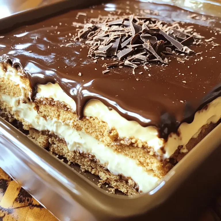 This No Bake Chocolate Eclair Cake is a simple yet rich dessert. You can prepare it quickly with just a few ingredients. The cool and creamy layers create a delightful treat for any occasion. You can find the full recipe at the end. Here’s what you need to make this tasty cake: - 1 package (14 oz) graham crackers - 2 cups cold milk - 2 packages (3.4 oz each) instant vanilla pudding mix - 1 container (8 oz) whipped topping, thawed - 1/2 cup powdered sugar - 1/4 cup cocoa powder - 1/4 cup unsweetened chocolate syrup - 1 teaspoon vanilla extract These ingredients work together to create a soft and tasty cake that everyone will love. You can add a little extra fun with these toppings: - Shaved chocolate - Chocolate sprinkles These garnishes give your cake a beautiful finish and make it even more tempting! To start, gather your ingredients. Pour 2 cups of cold milk into a large bowl. Add 2 packages of instant vanilla pudding mix. Whisk these together for about 2 minutes. You want the mixture to be thick and smooth. This will create your delicious pudding base. Next, take your thawed whipped topping and gently fold it into the pudding. Keep mixing until there are no lumps. This creamy filling is key to your cake's texture. Now, let’s make the chocolate glaze. In a separate bowl, combine 1/2 cup of powdered sugar, 1/4 cup of cocoa powder, and 1/4 cup of chocolate syrup. Add in 1 teaspoon of vanilla extract. Mix these until you have a smooth glaze. This sweet coating will enhance the cake's flavor and look. Grab your 9x13 inch baking dish. Start by placing a layer of graham crackers at the bottom. Make sure they fit well. Spread half of the creamy pudding mixture over the crackers. Use a spatula to smooth it out evenly. Repeat this process: add another layer of graham crackers, then the remaining pudding. Finish with a final layer of graham crackers on top. Now, pour the chocolate glaze over the top layer. Spread it evenly for a nice finish. Cover your dish with plastic wrap and refrigerate for at least 4 hours. This chilling time is crucial for the flavors to blend. When ready to serve, slice it into squares. Enjoy your no bake chocolate eclair cake! For the complete instructions, check the Full Recipe. To get great layers, use fresh graham crackers. Make sure they are not crushed. Lay them flat in the dish. Each layer should be even. This helps the cake hold together. Spread the pudding gently. Use a spatula to smooth it out. Don't rush; take your time for a nice look. A creamy filling is key. Start by whisking the cold milk with the pudding mix. Whisk for a full two minutes. This thickens it up well. Next, fold in the whipped topping carefully. Use a spatula to mix, but don’t overdo it. You want it smooth, not runny. This mix will give you that rich, creamy texture. One common mistake is not chilling the cake long enough. It needs at least four hours. Otherwise, it won’t set right. Another mistake is using warm milk. Always use cold milk for the pudding. Lastly, don’t skip the chocolate glaze. It adds a delicious layer of flavor. Follow these tips, and your cake will shine. For the full recipe, see above. {{image_4}} You can easily change the flavor of your No Bake Chocolate Eclair Cake. For a mint twist, add a few drops of mint extract to your vanilla pudding. If you love coffee, mix in instant coffee granules instead. You can also try caramel syrup for a sweet touch or hazelnut spread for a nutty flavor. These simple swaps make each bite unique. To make this cake dairy-free, use almond milk or coconut milk. Replace the whipped topping with a dairy-free version to keep it creamy. If you need a gluten-free option, choose gluten-free graham crackers. These swaps make your dessert fit various diets while keeping all the fun. Toppings can really change the look of your cake. You can sprinkle crushed cookies or toasted nuts on top for added crunch. Fresh berries, like strawberries or raspberries, add color and a fruity taste. For a classic look, use shaved chocolate or chocolate sprinkles. Each topping gives your cake a personal touch and makes it more appealing. For the full recipe, check out the Chocolate Cream Delight Éclair Cake . To store leftovers of your no bake chocolate eclair cake, cover it tightly with plastic wrap. This keeps the cake fresh and prevents it from drying out. You can also place it in an airtight container. Make sure to keep it in the fridge. It tastes great cold, and the flavors will get even better overnight. You can freeze this cake if needed. First, let it chill in the fridge for at least 4 hours. Once it's set, slice the cake into squares. Wrap each square tightly in plastic wrap. Place the wrapped pieces in a freezer-safe bag or container. This way, you can enjoy your sweet treat later. Just remember to thaw it in the fridge for a few hours before eating. The no bake chocolate eclair cake can last in the fridge for about 3 to 5 days. After that, the texture may change, and it may not taste as good. For the best quality, try to eat it within the first two days. To keep it fresh, always cover it well and don’t leave it out at room temperature for long. Enjoy every bite of this easy and delicious treat! Yes, you can make this cake ahead of time. In fact, I recommend it! Making the cake a day before lets the flavors mix well. This chilling time helps the layers set, giving you a better texture. Just be sure to cover it tightly with plastic wrap to keep it fresh. The cake needs at least 4 hours to chill. However, if you can wait longer, overnight is best. This extra time allows the pudding to thicken up. The graham crackers soften nicely, making each bite delicious and creamy. If you don’t have graham crackers, try using vanilla wafers or digestive biscuits. Both options will work well and add a unique twist. You can also use a gluten-free alternative if needed. Just keep the layering method the same for the best results. For the Full Recipe, refer to the earlier section for a complete guide! No Bake Chocolate Eclair Cake is easy to make and fun to enjoy. We covered the key ingredients and offered tips for perfect layers. You learned to make a creamy filling and about flavor swaps. Remember, this cake is flexible in ways to store and serve. It can stay fresh in the fridge or be frozen for later. Now, you have what you need to impress your friends and family. Enjoy making this delicious dessert!